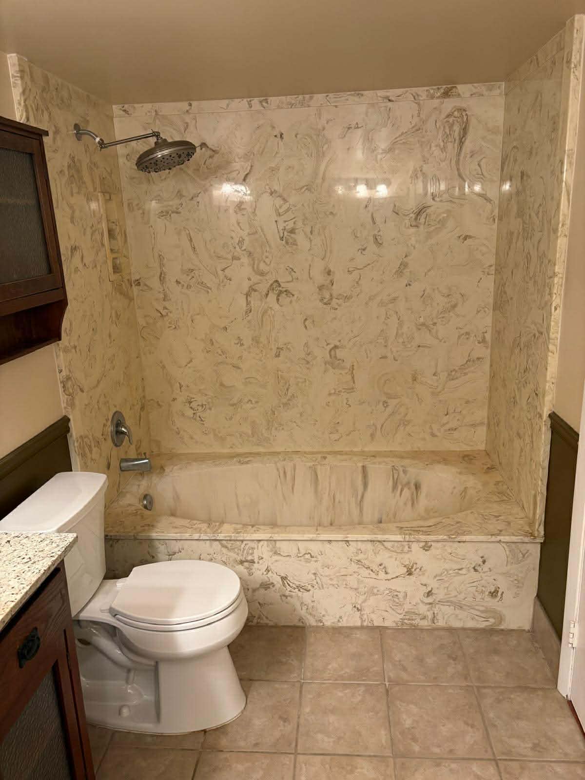 Bathroom before remodel - outdated fixtures and dated design